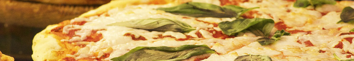 Eating Pizza at Ciro's Pizza restaurant in Smithtown, NY.